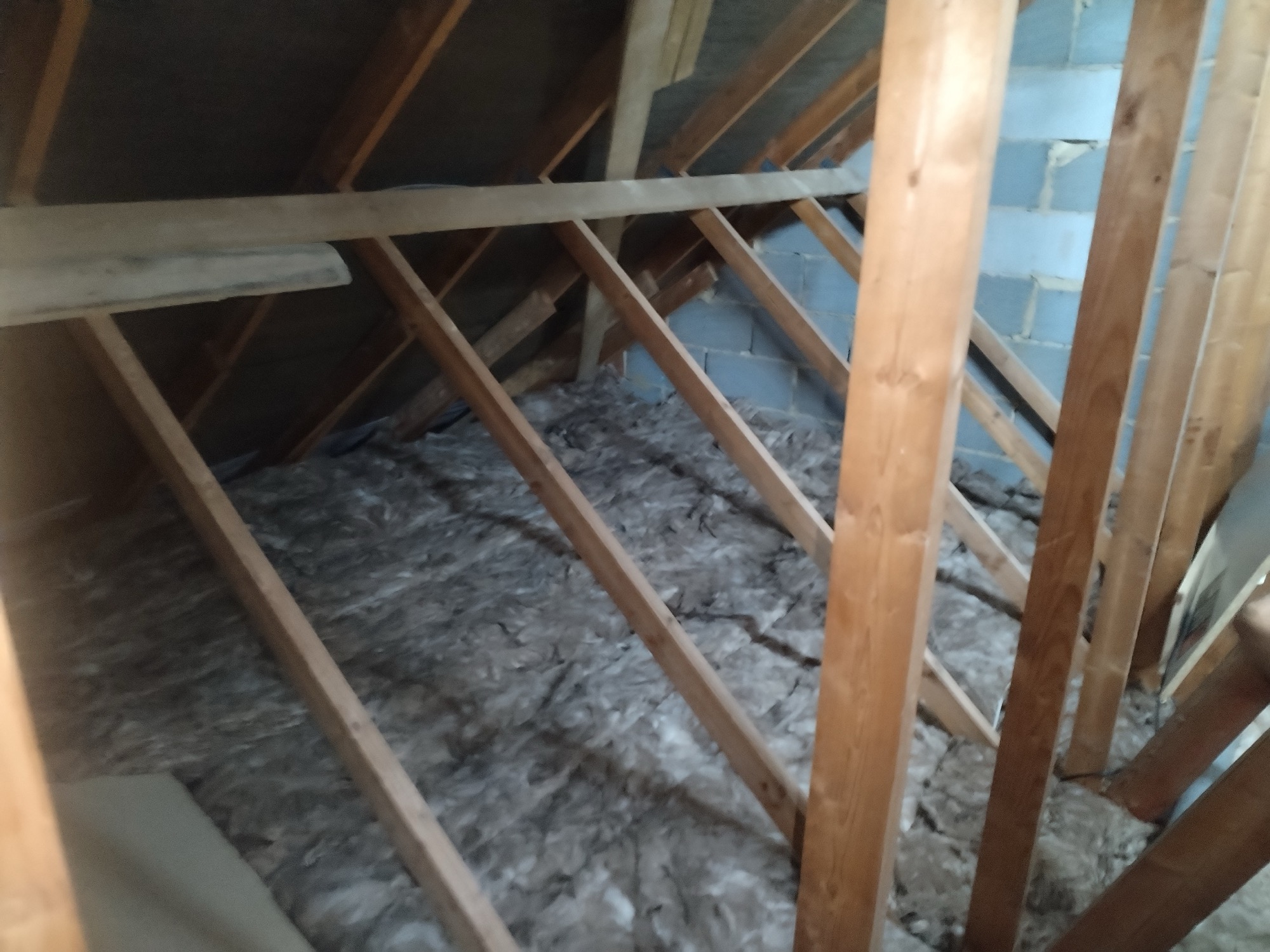 A completed loft insulation installation