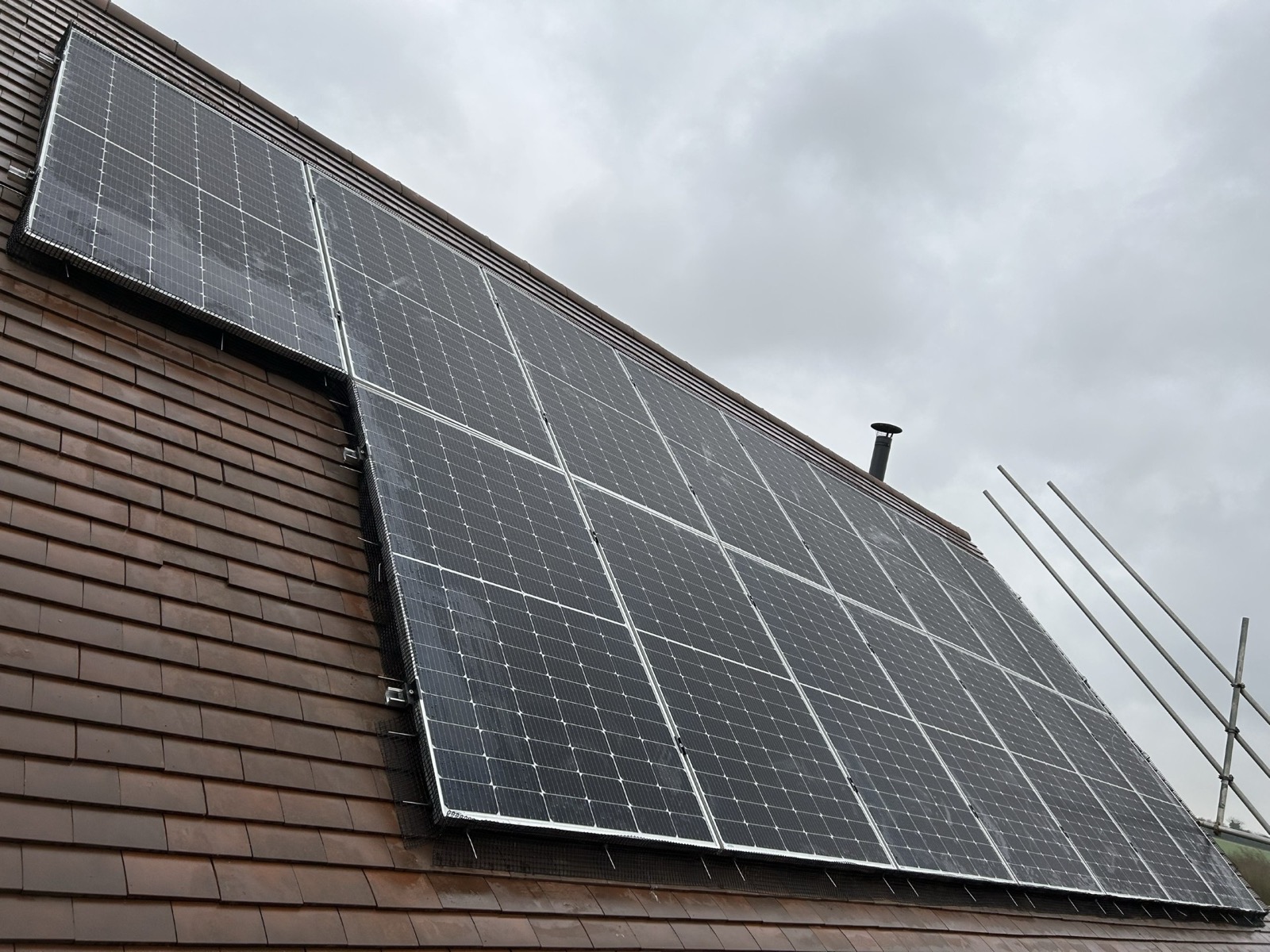 Solar panels installed on a slate roof